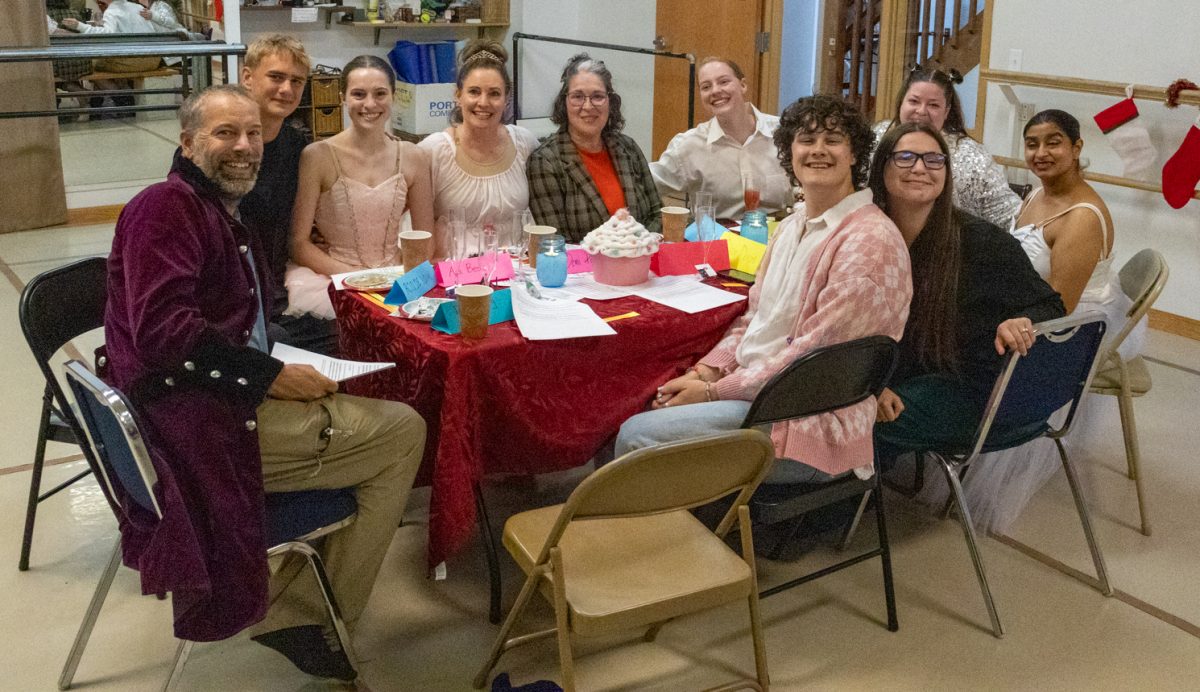 Guests from one side pose for a group photo during "Nutcracker Nightmare: A Ballet Murder Mystery" Sept. 13, 2025, at Front Range Classical Ballet Academy in Fort Collins, Colo.