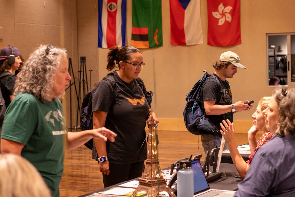 Students visit various booths during the Education Abroad fair at the Lory Student Center ballroom at Colorado State University on Sept. 12, 2025.