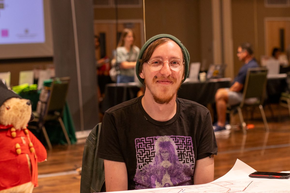 Zach Taylor at the Arts and Culture in the UK booth during the Education Abroad fair at the Lory Student Center ballroom at Colorado State University on Sept. 12, 2025. Taylor, who recently studied abroad, recalled his time spent in the United Kingdom as "fully life changing."