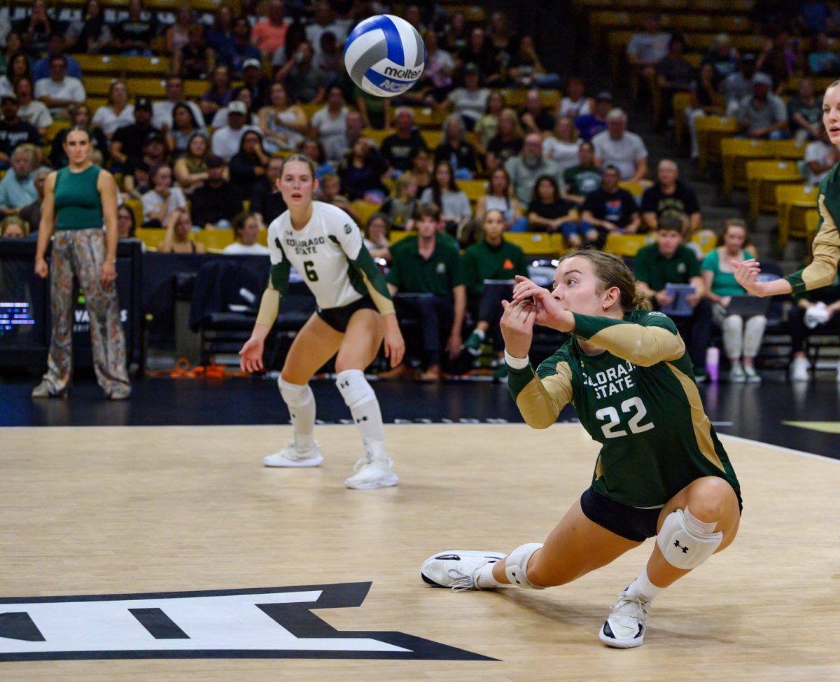 Colorado State University defensive specialist Delaney McIntosh (22) passes the ball up to her teammates during CSU's game against the University of Colorado in the CU Events Center Sept. 19. CSU won 3-1. 