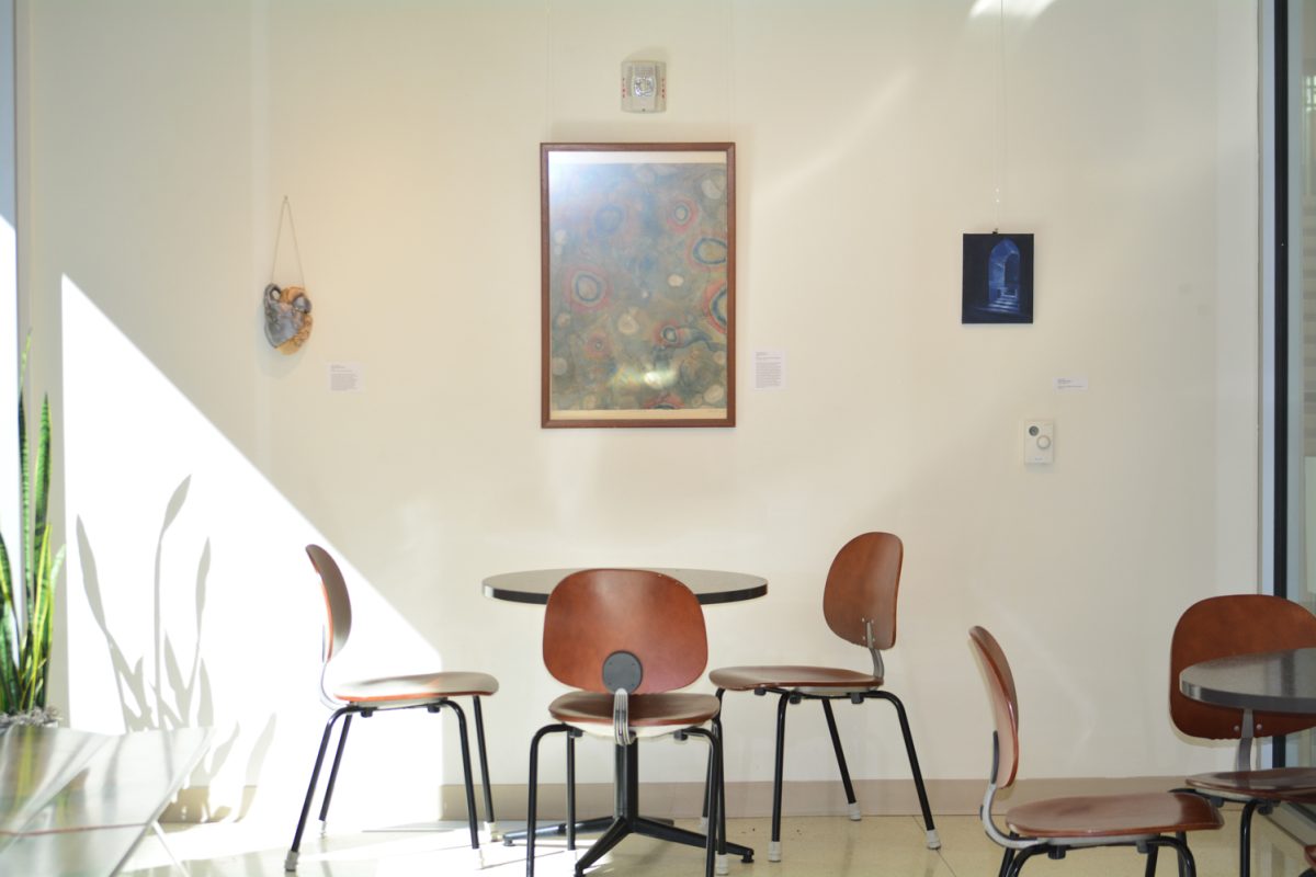 Located in the Lory Student Center's Sideshow Gallery, three art pieces are showcased as part of the "Off The Clock" exhibition Sept. 25.