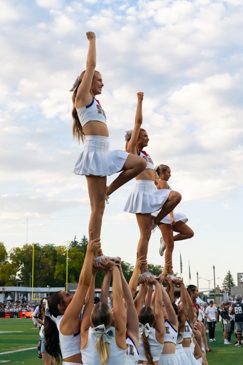 Members of the Colorado State University Spirit Squad perform on the sidelines as the Rams took on Washington State University in Canvas Stadium Sept. 27. 