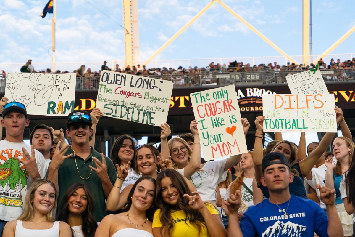 Colorado State University students hold up signs in the student section during the State Pride football game against Washington State University in Canvas Stadium Sept. 27. The Rams lost to the Cougars 20-3.