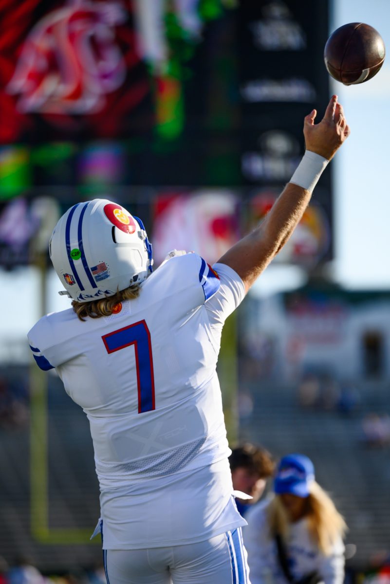 Colorado State University quarterback Jackson Brousseau (7) throws the ball during warmups before CSU's game against Washington State University Sept. 27.