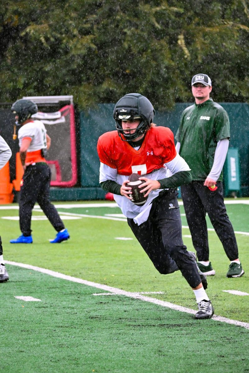 Jackson Brousseau (7) runs offensive plays Sept. 23 during practice in preparation for Colorado State University's game upcoming game against Washington State University. Head coach Jay Norvell recently named Brousseau as starting quarterback. 