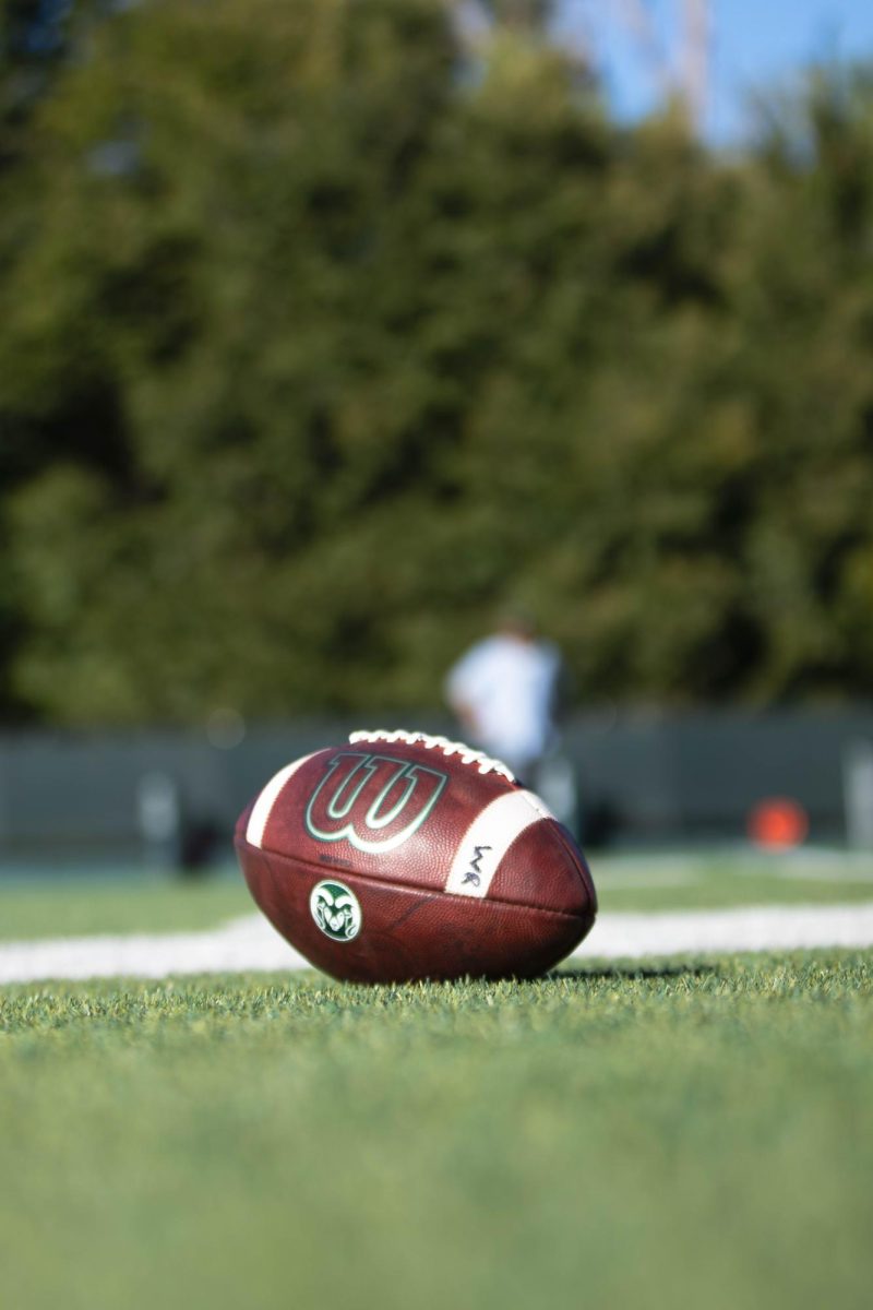 Colorado State University football sits on the sideline during Tuesday morning practice on Sept. 30th at Colorado State University in Fort Collins Colorado. Photo taken by Erica Pickering.
