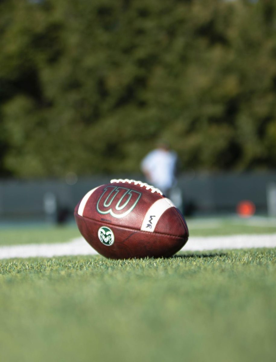 Colorado State University football sits on the sideline during Tuesday morning practice on Sept. 30th at Colorado State University in Fort Collins Colorado. Photo taken by Erica Pickering.