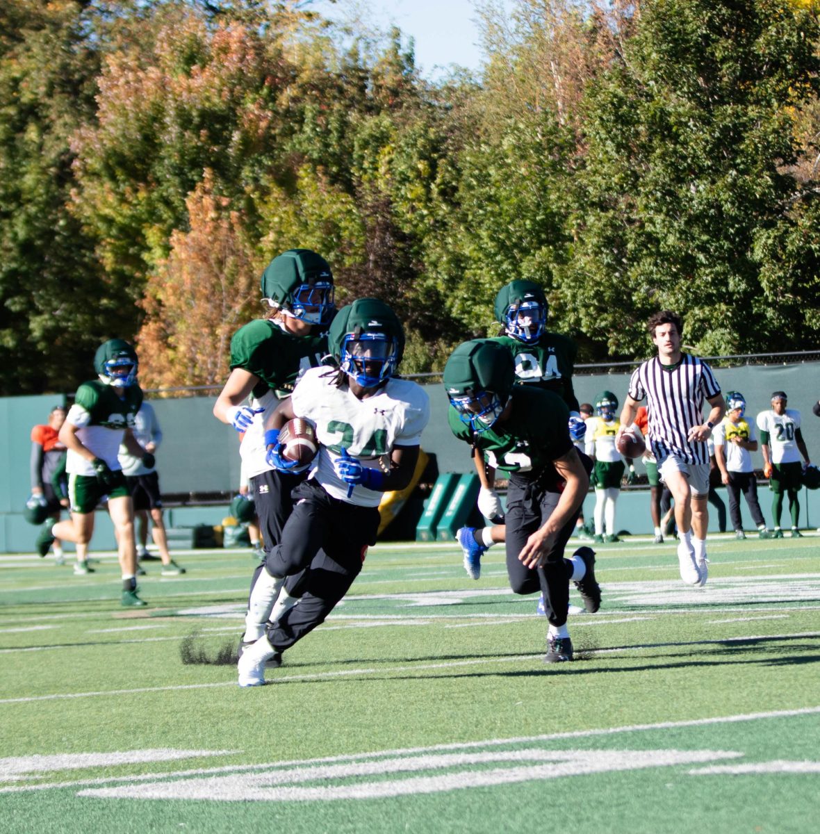 Running Back, Amare Gomez, runs the ball during a scrimmage at morning practice at Colorado State University in Fort Collins Colorado on Tuesday Sept. 30th. Photo taken by Erica Pickering.