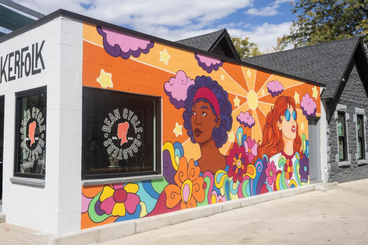 A mural by Alex Bugg beams with vibrancy on the side wall of Bean Cycle Roasters on Walnut Street in Old Town Square Sept. 30.