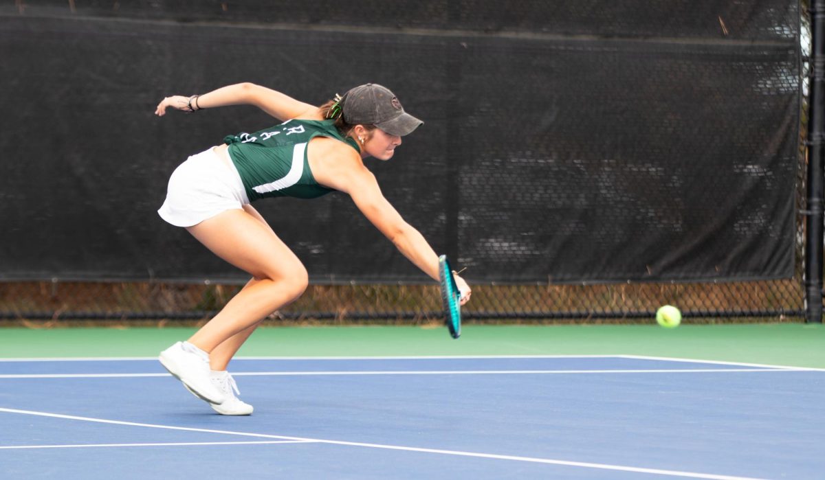 Dylan Voeks moments before hitting the ball during the match at the Jon Messick Invitational at the CSU Tennis Complex in Fort Collins Colorado on Friday Sept. 12th. Photo taken by Erica Pickering.