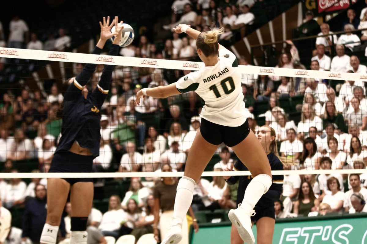 Colorado State University's middle blocker Brenna Rowland hits the ball back to Notre Dame in Moby Arena in Fort Collins Colorado, on Friday Sept. 12th. Photo taken by Erica Pickering.