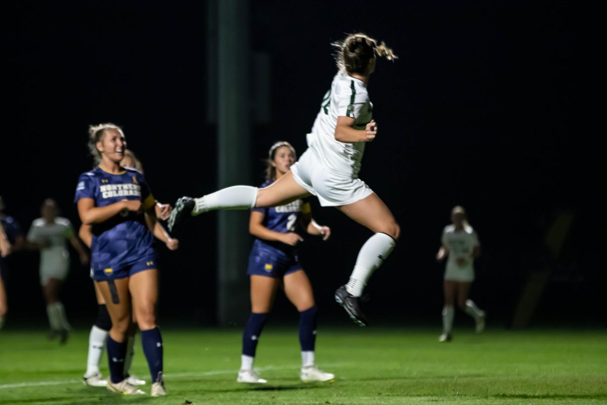 Colorado State University jumps for the ball in the game against the University of Northern Colorado at Colorado State University in Fort Collins Colorado on Sept. 4th, photo taken by Erica Pickering.