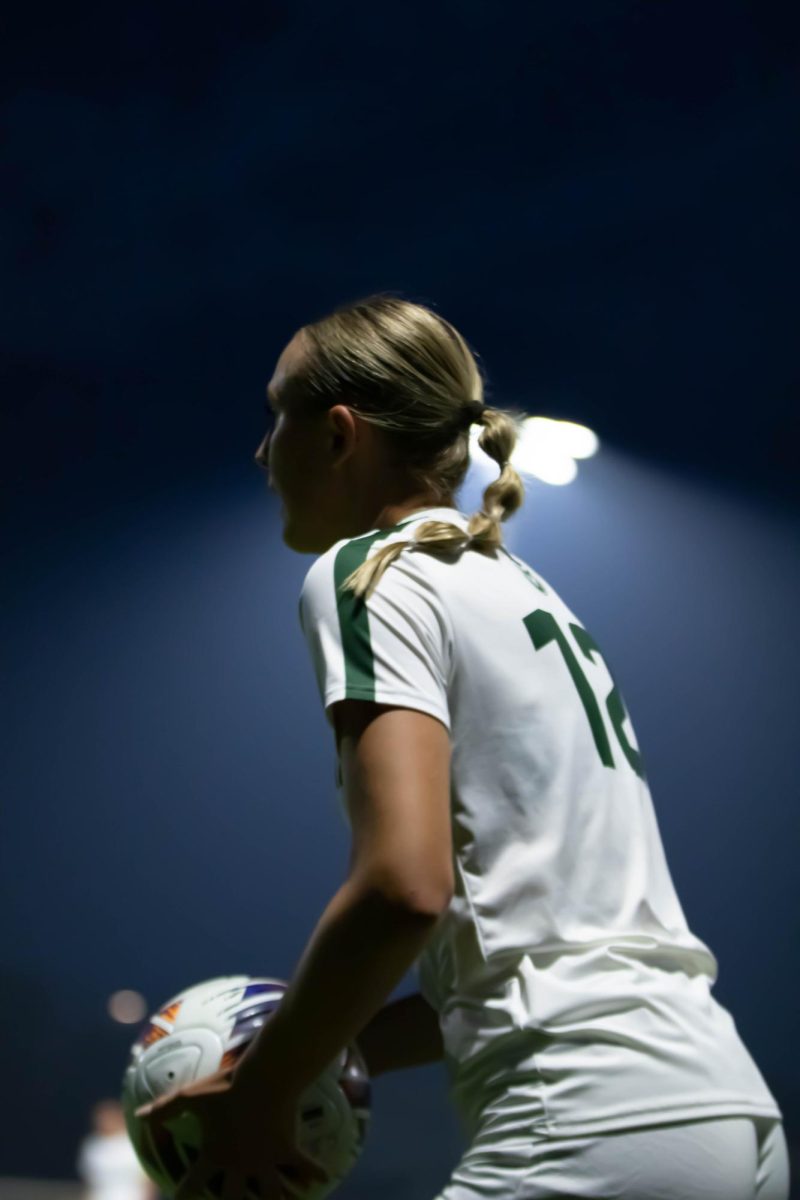 Piper Carlson defender on the Colorado State University Women's Soccer team, throws the ball inbounds, during the game against University of Northern Colorado on Sept. 4th in Fort Collins Colorado. Photo taken by Erica Pickering