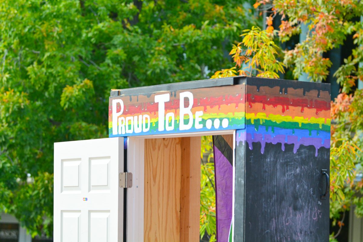 A photo booth opening that states "Proud to be.."