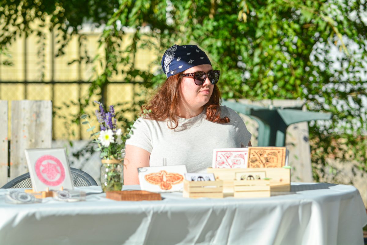 Natalie Cronin showcasing pieces of her art at the Common Ground event Oct. 19. "This is an event with the Alpine Arts Collective who are promoting pursuing the arts through nature" Natalie states "Its mainly promoting artists that work with nature or convey nature in their artwork."