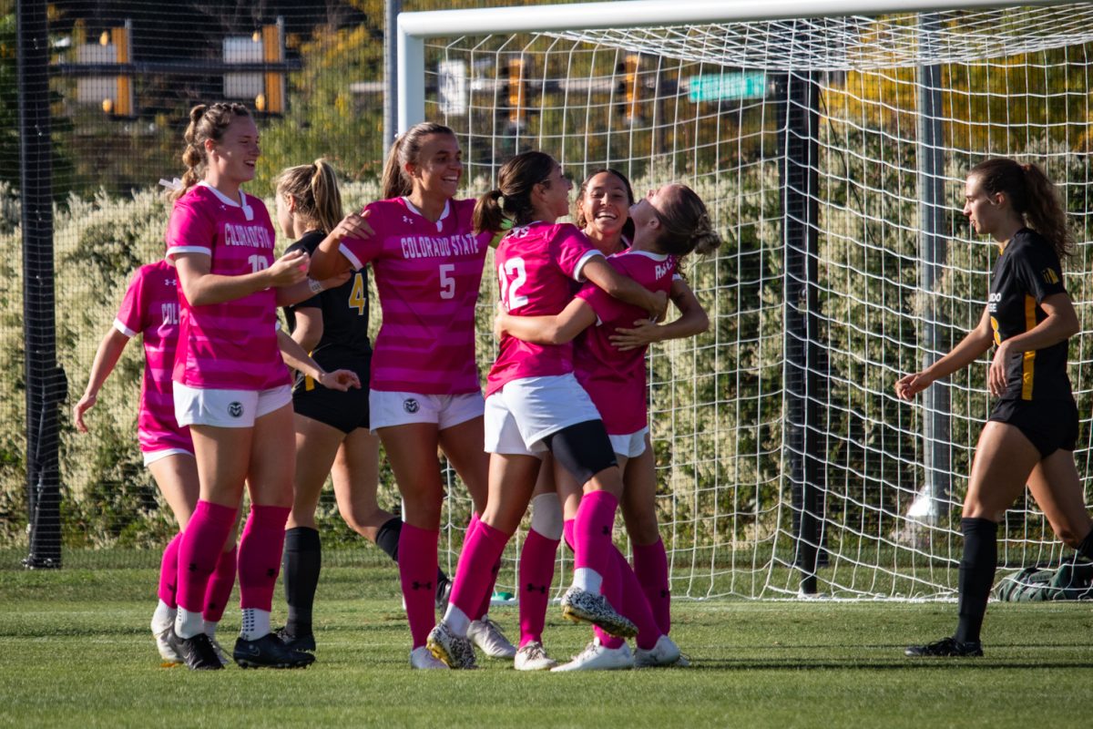 The Colorado State Rams celebrate after Kacie Laurie (1) scored a goal 49 seconds into the match against Colorado College Oct 9. The Rams went on to beat the Tigers 2-1.