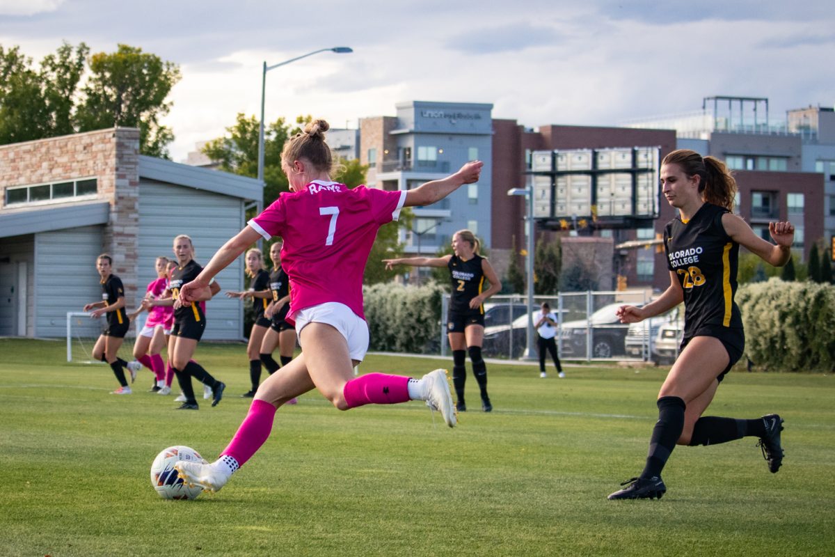 Michaela McGowan (7) kicks the ball around a defender match against Colorado College Oct 9. The Rams went on to beat the Tigers 2-1.