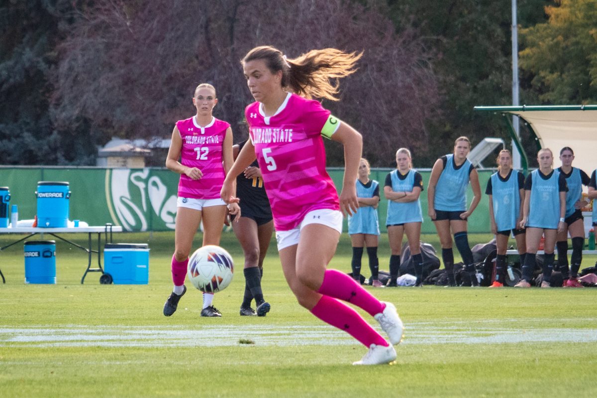 Mia Massey (5) dribbles the ball during the match against Colorado College Oct 9. The Rams went on to beat the Tigers 2-1.