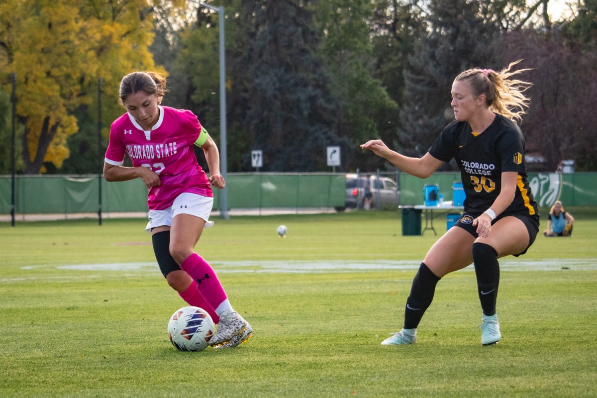 Mia Casey (22) avoids a defender during the match against Colorado College Oct 9. The Rams went on to beat the Tigers 2-1.