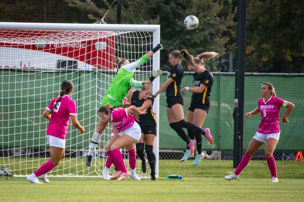 Goalkeeper Gray Wilson (45) punches the ball above the heads of Colorado College players during the match Oct 9. The Rams went on to beat the Tigers 2-1.