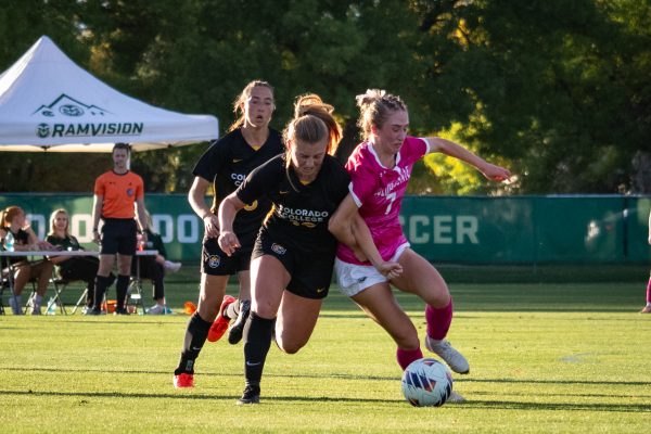 Michaela McGowan (7) fights with a Colorado College player for the ball during the match Oct 9. The Rams went on to beat the Tigers 2-1.