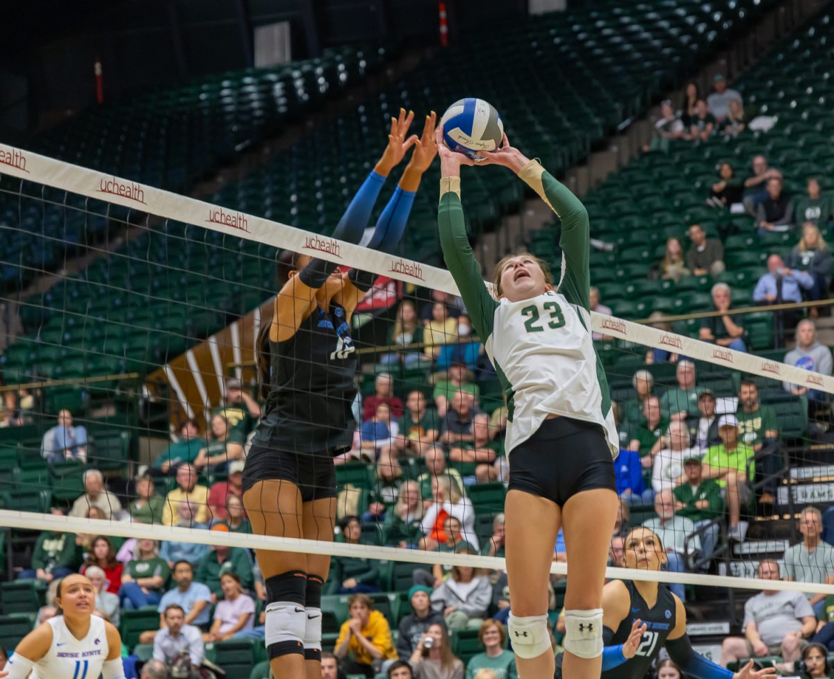 Erin Debic (23) back sets the ball in Colorado State University's volleyball match against Boise State University Oct. 9. Colorado State won 3-0.