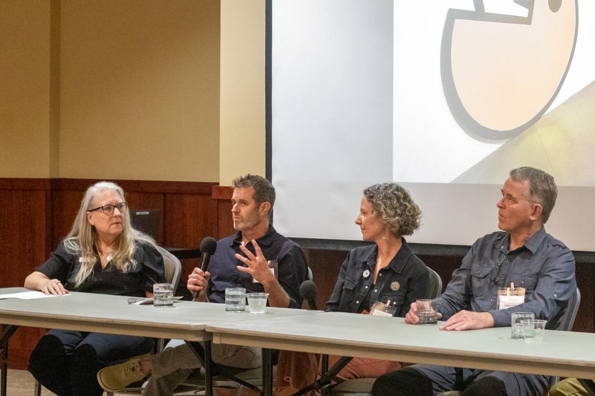 Stephen Shachtman, Allie Ogg, Gregory Fields, and Todd Kundla sit on a panel during an artist panel discussion Oct 10. "[When] you see things that are site specific and designed by these people from the region and visiting artists […], it's like putting a bouquet of flowers on a table," Kundula said. "It just adds that special feeling of caring."