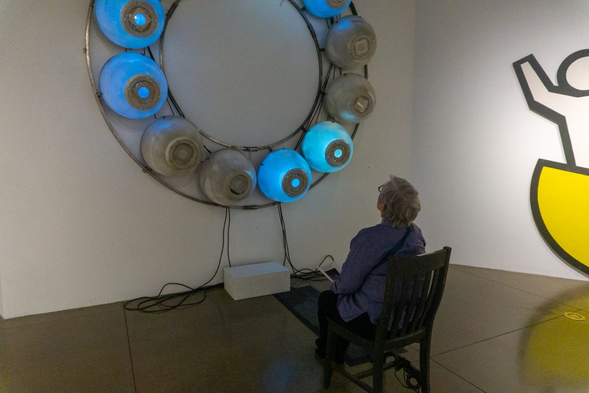 Shauna Struby sits in an interactive artwork in the Lincoln Center Gallery Oct 10. The art gallery showcases the personal artwork of 6 artists who are creating art to enrich local public spaces.