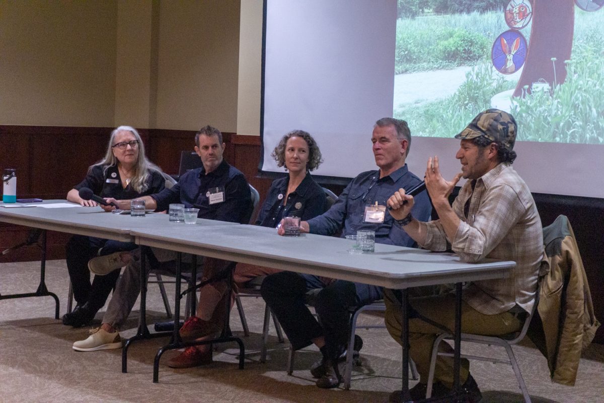 Stephen Shachtman, Allie Ogg, Gregory Fields, and Todd Kundla sit on a panel during an artist panel discussion Oct 10. "[When] you see things that are site specific and designed by these people from the region and visiting artists […], it's like putting a bouquet of flowers on a table," Kundula said. "It just adds that special feeling of caring."
