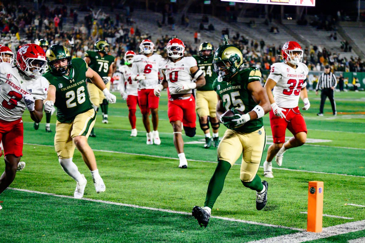 Colorado State University running back Lloyd Avant (25) sprints to the endzone during CSU's game against Fresno State University Oct. 10. CSU won 49-21. 