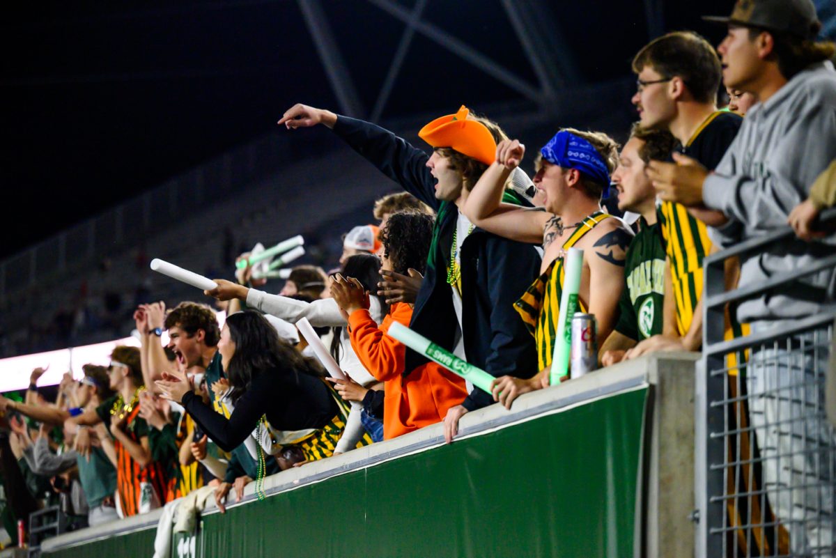 Colorado State University's student section cheers on a sucessful play during CSU's game against Fresno State University Oct. 10. The reported crowd of the game was 27,874 attendees.
