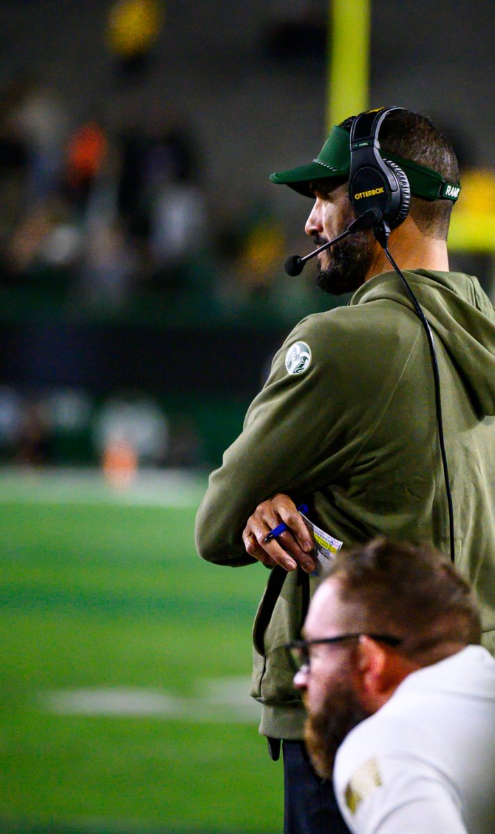 Colorado State University head football coach Jay Norvell watches the field in between plays during CSU's game against Fresno State University Oct. 10. Norvell had many positive things to say about the team's performance after their 49-21 win. "Our kids have been diligent," he said.  "We haven't had the execution that we wanted, but we've never quit. That's why I believe that better things are down the road for this group and I think this is an example."