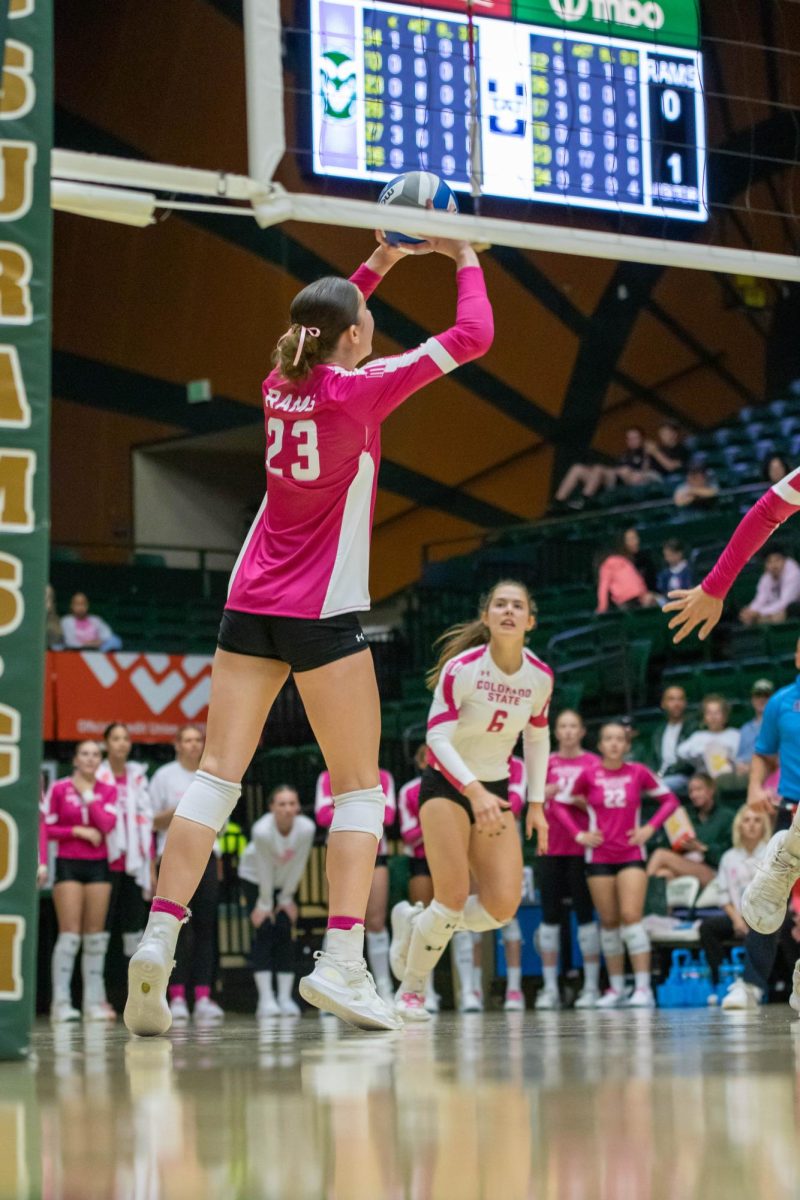 Erin Debiec (23) sets the ball for her teammates during Colorado State University's volleyball game against Utah State University in Moby Arena Oct 11.