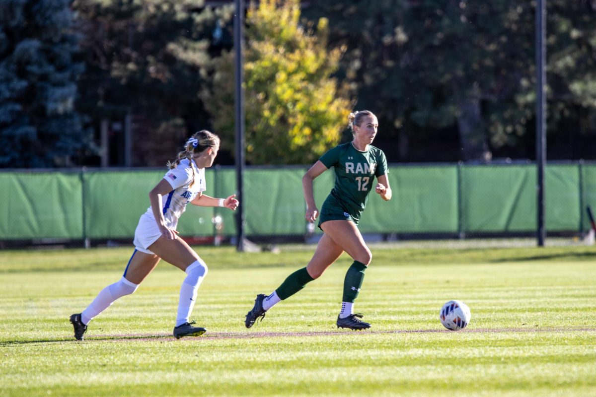 Piper Carlson dribbles the ball at the Colorado State Soccer Field. Colorado State University played against Air Force Academy, tying 1-1 Oct. 12.