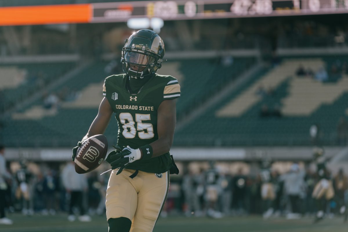 A football player with the ball.