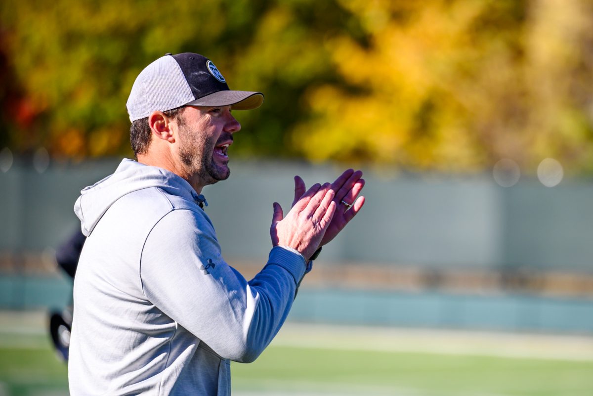 Colorado State University football interim head coach Tyson Summers encourages the team between drills during football practice Oct. 21. 
