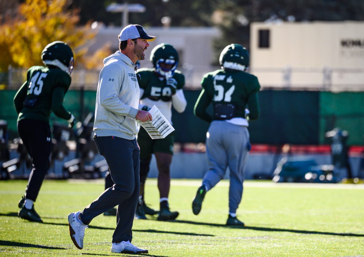 Colorado State University football interim head coach Tyson Summers announces a change in drills during football practice Oct. 21. 
