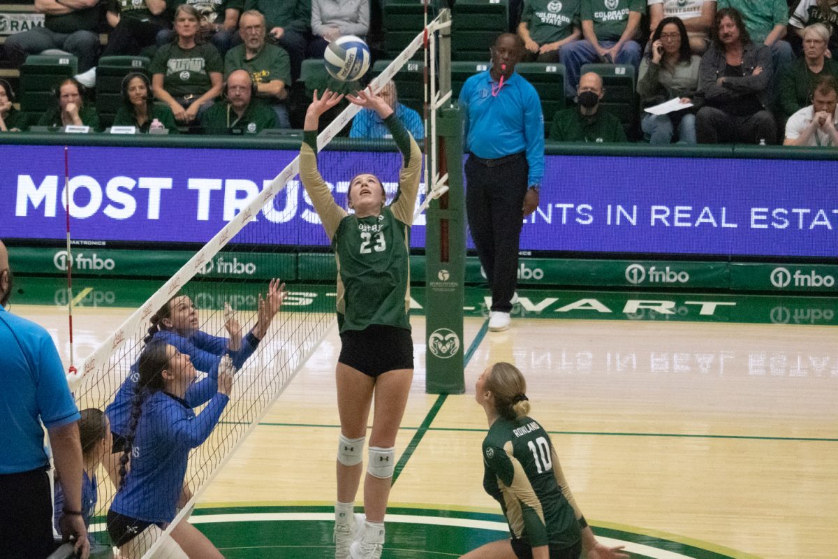 Erin Debiec (23) sets the ball on the net  during the match versus Air Force Oct 23. The Rams beat the Falcons 3-1.