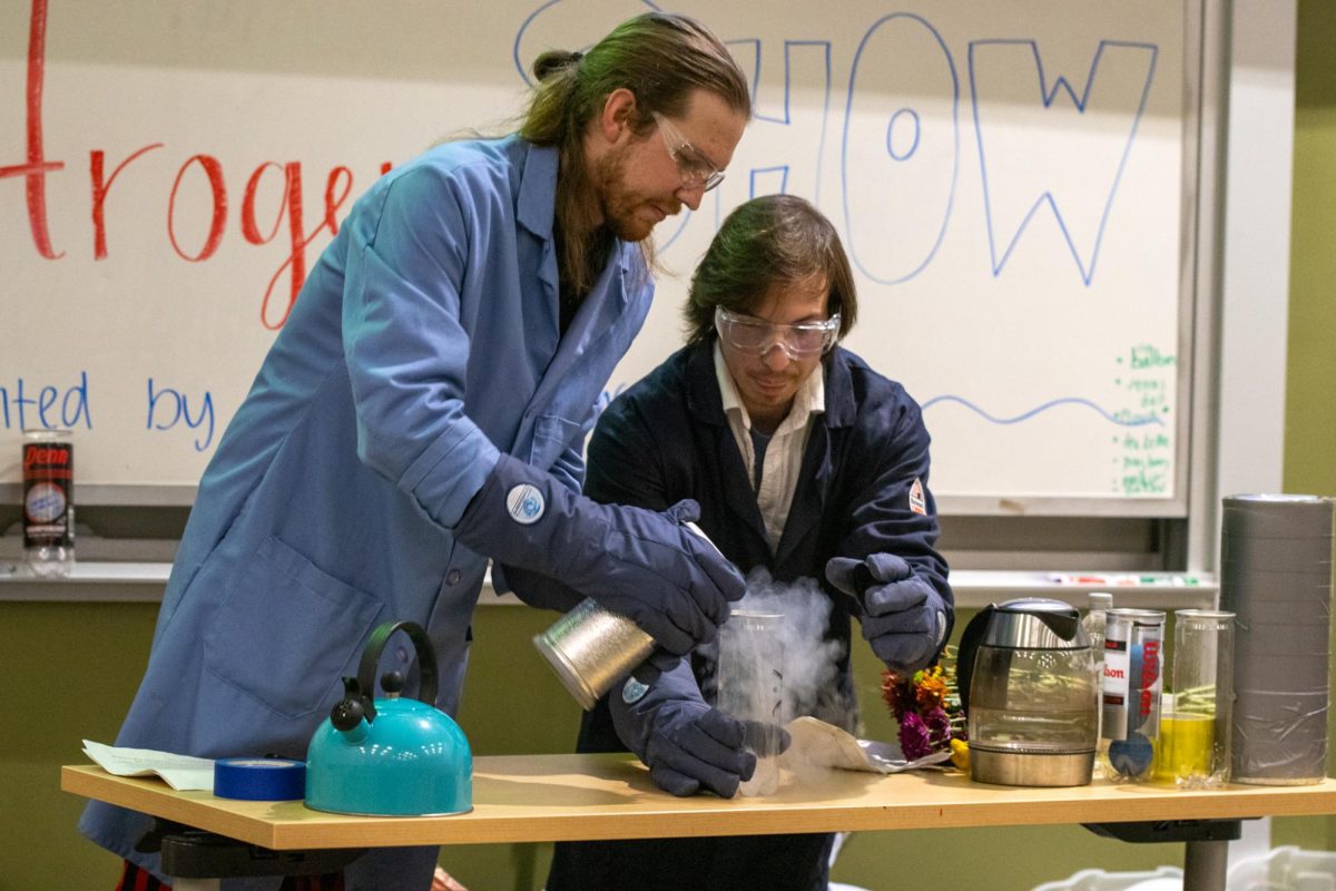 Colorado State University graduate students Drew Schlink and Joshua Head perform an experiment with liquid nitrogen during the CSU Chemistry Club's annual Halloween show Oct 25. Schlink said he loves the event because it gives him the opportunity to teach and get younger kids interested in chemistry. “Doing it now is the perfect time to give them some fun stuff to see, and I get to have fun with liquid nitrogen," Schlink said.