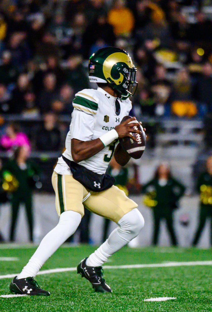 Colorado State University football quarterback Darius Curry (3) gets ready to throw the ball during CSU's Border War game against the University of Wyoming Oct. 25.