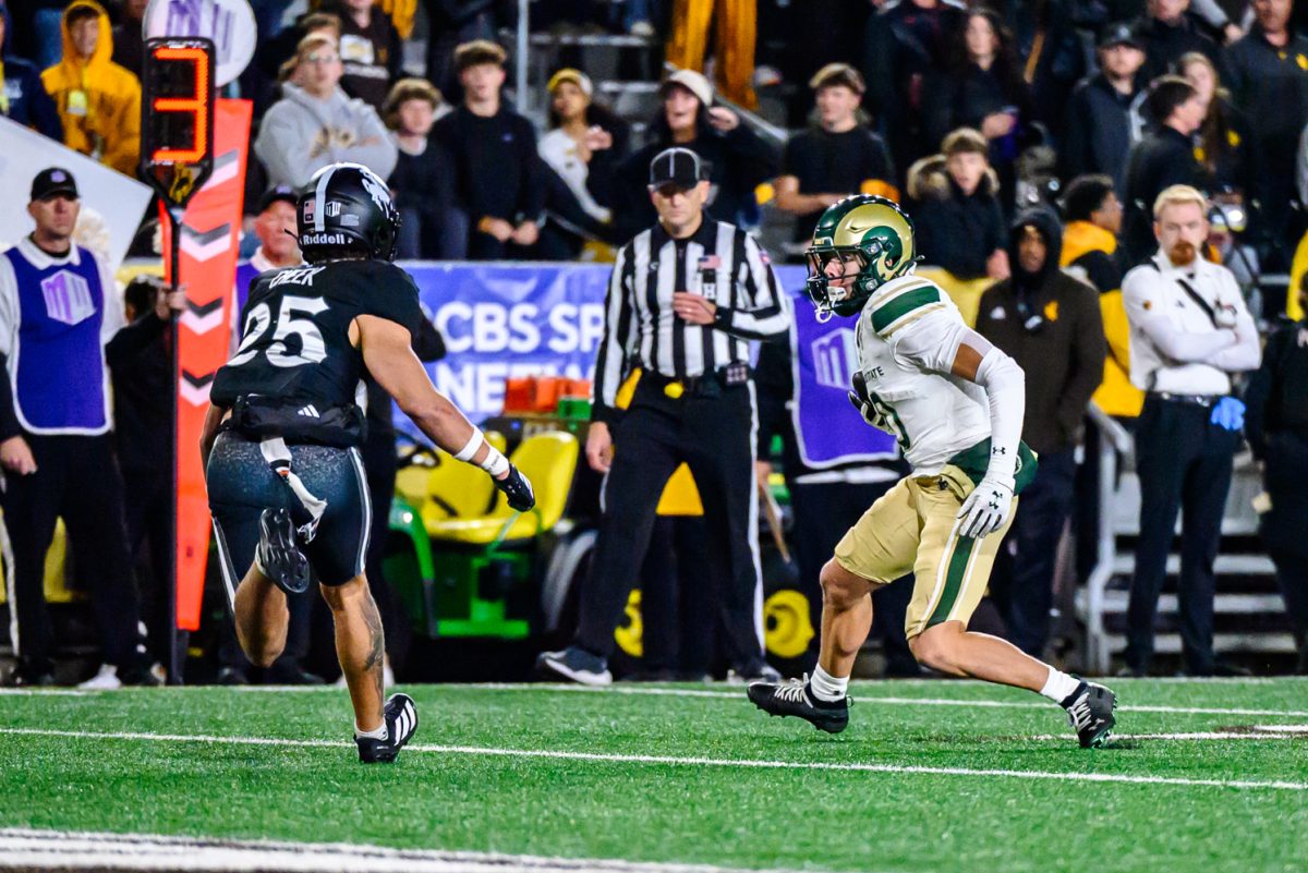 Colorado State University football wide receiver Tommy Maher (10) attempts a run at the endzone against the University of Wyoming Oct 25.