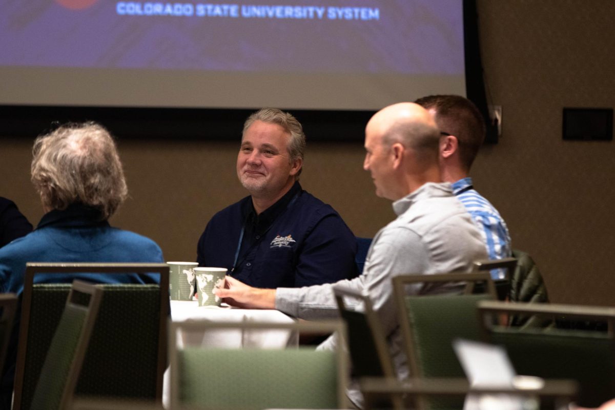 Atendees engagaging before the start of the CSU Ignites AI: Shaping Tomorrow Together event at Colorado State University Fort Collins Colorado Oct. 14.