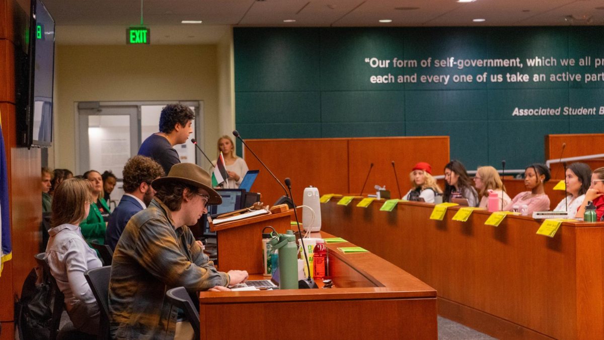 ASCSU Director of Unified Success Ben Gregg speaks during Gallery Input at the Oct. 8 ASCSU Senate Session. "I've always thought that to ignore the cries of the oppressed is to become a voice for the oppressor," said Gregg. "I've seen what it looks like firsthand when good people don't stand up for what they believe in. I've seen comfort and convenience outweigh courage. I've seen the walls go up and voices shut down. So I say this now to anyone who thinks their silence protects them, to anyone who believes doing nothing is harmless, your silence is a weapon, and your inaction has consequences."