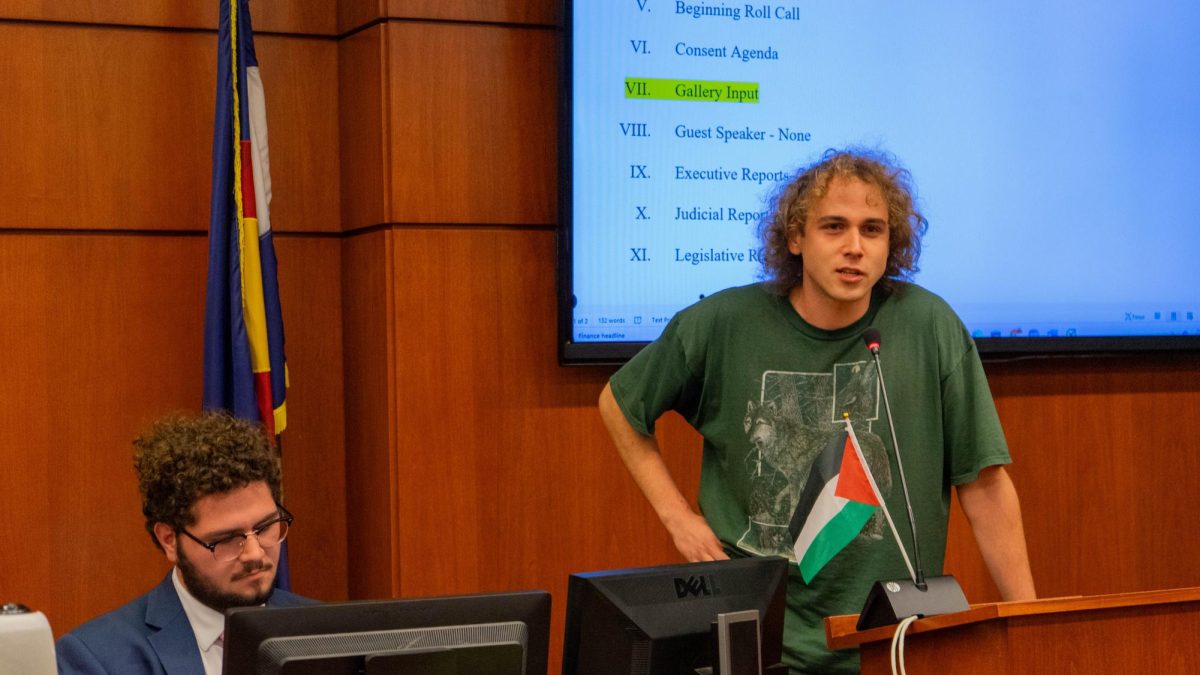 Young Democratic Socialists of America Faculty Advisor Michael May speaks during ASCSU Senate Gallery Input Oct. 8. "I have always thought that universities need to be more democratic," May said. "This is something that simply, you know, we all pay into this institution. We should have our voices heard. We should all, at the very least be able to, you know, have more effect on policy than simply just yelling into the void and not having the void look back at us."