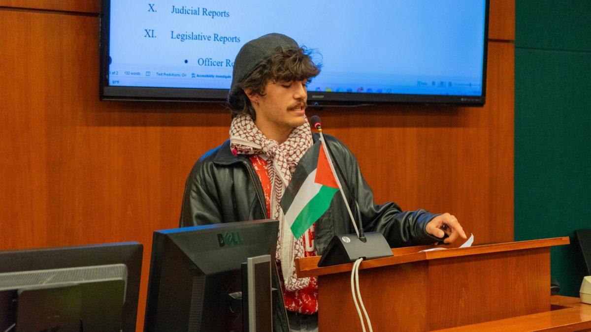 Young Democratic Socialists of America Co-Chair Braden Albrecht speaks during ASCSU senate gallery input on Oct. 8. "I ask how restricting expression of students really helps them," Albrecht said. "It helps the university in their legal complaint. It's very curious. It's scary seeing views like mine and identity is like those of my comrades being oppressed and censored. It's equally scary seeing an institution that I call my own welcoming the targeting of these students."