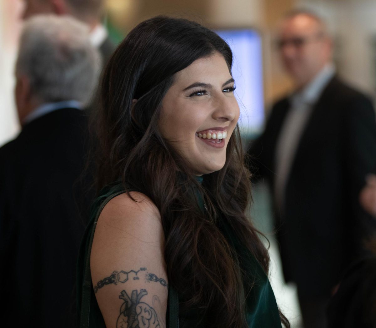 Atendee of th Alumni Awards event at Colorado State University laughs with peers in Fort Collins Colorado Oct. 16.