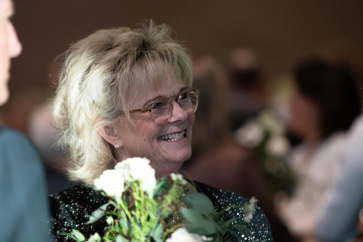 Nancy Richardsson, award recipitent of the William E. Morgan  Alumni Achievement Ward, laughs with other alumni and the Alumni Awards event at Colorado State University in Fort Collins Colorado, Oct. 16. "My roots go so deep here and CSU helped create the foundation in me." Said Richardson.