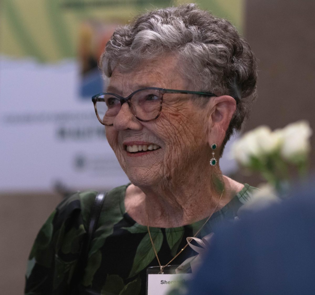 Sheron Golden, award recipient of the Distinguished Athletics Award, smiles with her fellow alumni at the Alumni Awards event at Colorado State University in Fort Collins Colorado, Oct. 16.