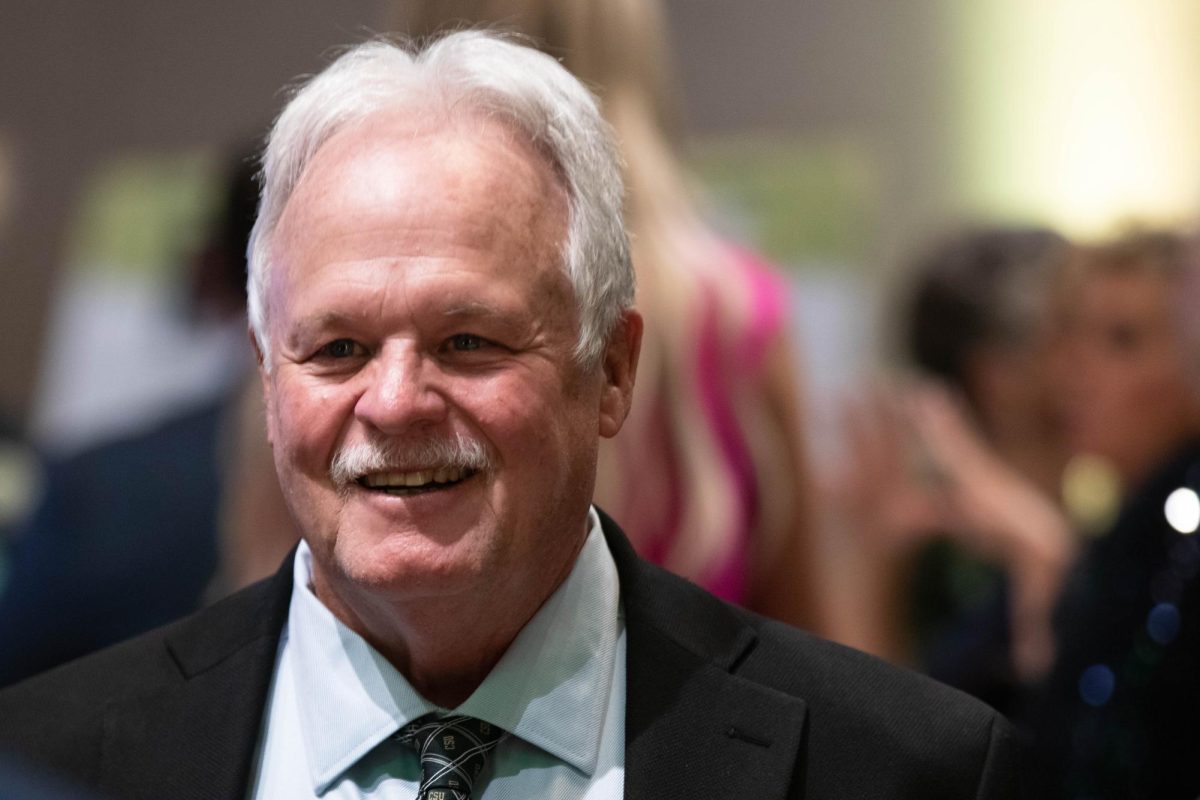 Kevin Keefe, award recipient of the Jim and Nadine Henry Award, engages with fellow alumni at the Alumni Awards event at Colorado State University in Fort Collins Colorado, Oct. 16. "I love this place." Said Keefe.