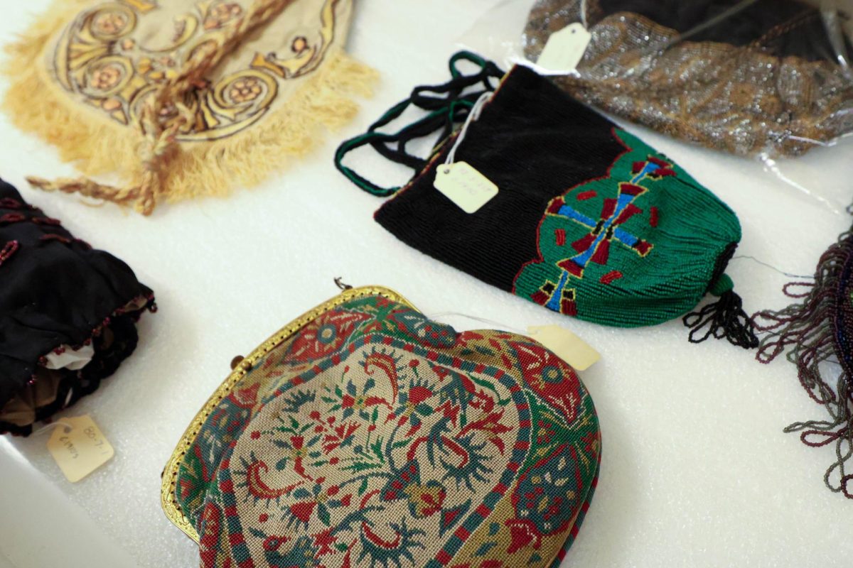 Coin bags are displayed in the Avenir Museum from cerca 1900s-1920s, allowing viewers to see a magnitude of styles during the time periods, Oct. 6. 
